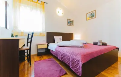 Krevet ili kreveti u jedinici u objektu 2 Bedroom Amazing Apartment In Omis