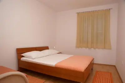Krevet ili kreveti u jedinici u objektu Apartments by the sea Stanici, Omis - 2763