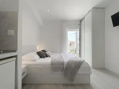 Krevet ili kreveti u jedinici u objektu Paladin Studio Apartments