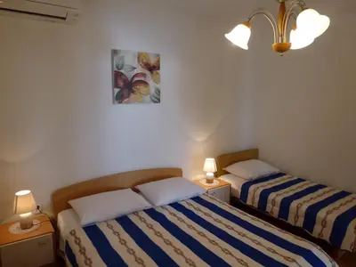 Krevet ili kreveti u jedinici u objektu Seaview Family Apartment with Grand Terrace