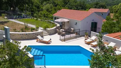 Bazen u objektu NEW! Villa AmaRosa - with heated pool and large playground ili u blizini