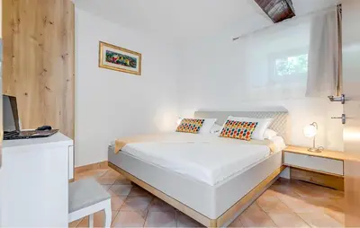 Krevet ili kreveti u jedinici u objektu 1 Bedroom Cozy Apartment In Bol