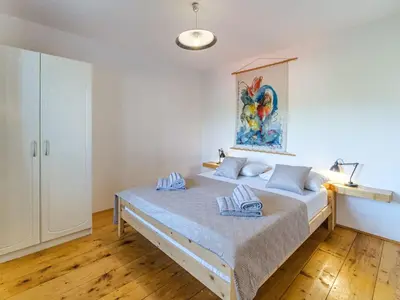 Krevet ili kreveti u jedinici u objektu Holiday Home Villa Tudor mit atemberaubender Aussicht by Interhome