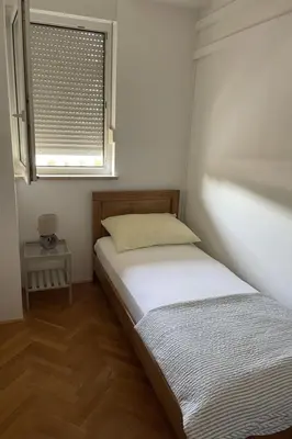 Krevet ili kreveti u jedinici u objektu Apartment Kinderfreundliches Appartement mit Garten by Interhome