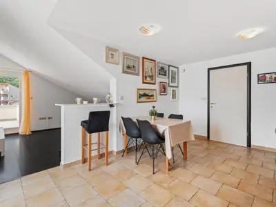 Tlocrt objekta Apartment Ferienappartement mit zwei Meerblick-Balkonen by Interhome