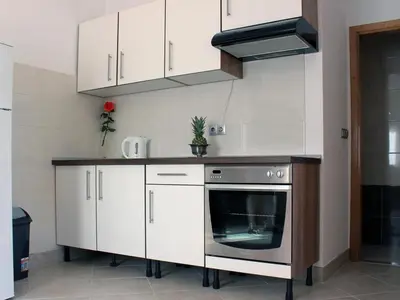 Kuhinja ili čajna kuhinja u objektu Apartment Mia Aufenthalt atemberaubender Meerblick kurzer Spaziergang zum Strand by Interhome