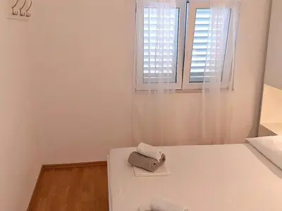 Krevet ili kreveti u jedinici u objektu Apartment mit Terrasse und herrlichem Ausblick by Interhome