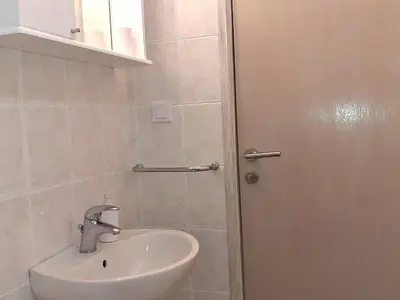 Kupaonica u objektu Apartment Wohnung mit Balkon und Meerblick in Strandnähe by Interhome