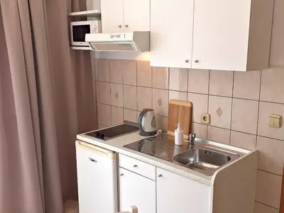 Kuhinja ili čajna kuhinja u objektu Apartment mit Balkon in Strandnähe by Interhome