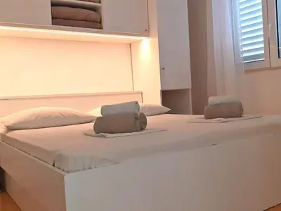 Krevet ili kreveti u jedinici u objektu Apartment mit Blick auf das Wasser by Interhome