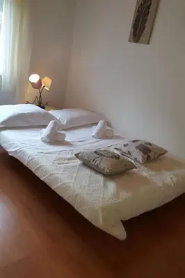 Krevet ili kreveti u jedinici u objektu Apartment mit Terrasse und herrlichem Ausblick by Interhome