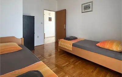 Krevet ili kreveti u jedinici u objektu Cozy Apartment In Necujam With House Sea View