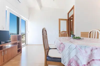 TV i/ili zabavni centar u objektu Seaside Apartments Ivo