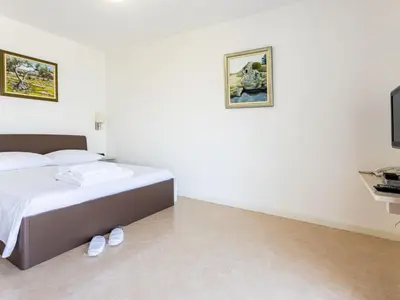Krevet ili kreveti u jedinici u objektu Apartment in der ersten Etage mit Meerblick by Interhome