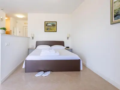 Krevet ili kreveti u jedinici u objektu Apartment in der ersten Etage mit Meerblick by Interhome