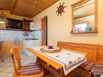 Kuhinja ili čajna kuhinja u objektu Holiday Home Mer Vue - Haus am Meer by Interhome