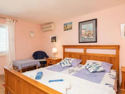Krevet ili kreveti u jedinici u objektu Holiday Home Mer Vue - Haus am Meer by Interhome