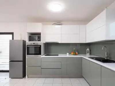 Kuhinja ili čajna kuhinja u objektu Holiday Home für 12 Personen in Stanići- Dalmatien - Mitteldal by Interhome