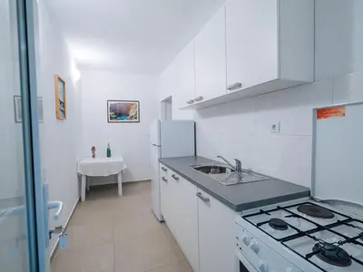 Kuhinja ili čajna kuhinja u objektu Apartment Weiße Idylle auf dem blauen Meer by Interhome