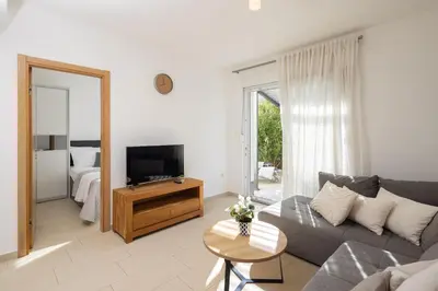 TV i/ili zabavni centar u objektu Apartments Olea