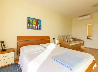 Krevet ili kreveti u jedinici u objektu Apartments Radevenjić