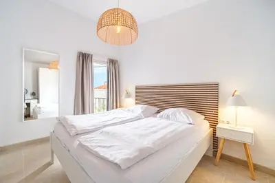 Krevet ili kreveti u jedinici u objektu Luke Family Villa Supetar