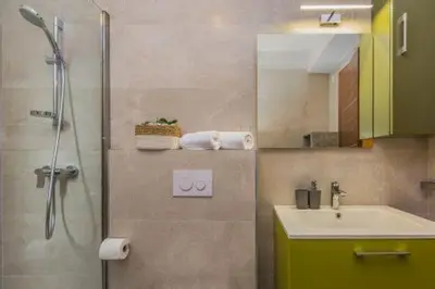 Kupaonica u objektu Villa REANA