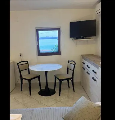 TV i/ili zabavni centar u objektu Studio Apartment Rose