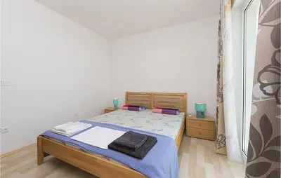 Krevet ili kreveti u jedinici u objektu 2 Bedroom Beautiful Apartment In Brela