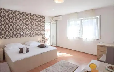 Krevet ili kreveti u jedinici u objektu Cozy Apartment In Podstrana With House Sea View