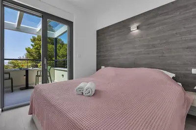 Krevet ili kreveti u jedinici u objektu Beachfront Apartment Sea - Residence Srzić