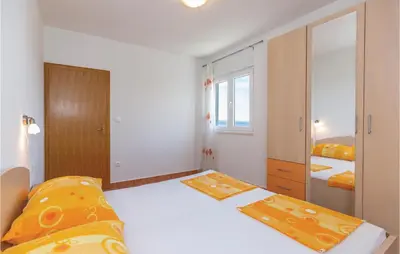 Krevet ili kreveti u jedinici u objektu Holiday Apartment Krvavica 07