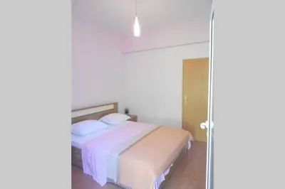 Krevet ili kreveti u jedinici u objektu Holiday Home with free parking by the beach