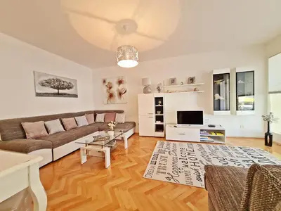 TV i/ili zabavni centar u objektu Beach Apartment Ivana