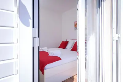Krevet ili kreveti u jedinici u objektu Guest House Milan
