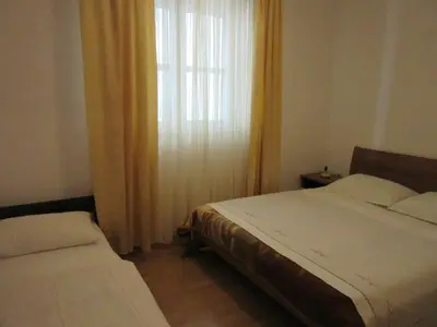 Krevet ili kreveti u jedinici u objektu Petar Apartments