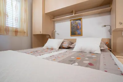 Krevet ili kreveti u jedinici u objektu Apartments Angela