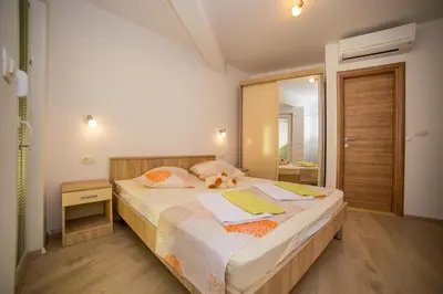 Krevet ili kreveti u jedinici u objektu Apartments Emil
