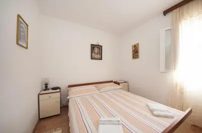 Krevet ili kreveti u jedinici u objektu Apartments Mira