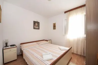 Krevet ili kreveti u jedinici u objektu Apartments Mira