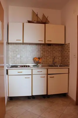 Kuhinja ili čajna kuhinja u objektu Apartments Bluesun