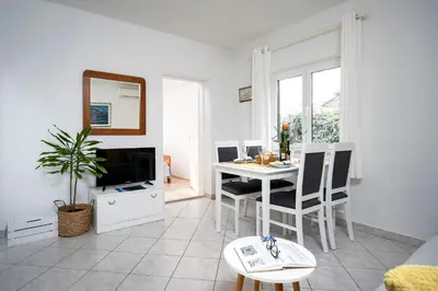 TV i/ili zabavni centar u objektu Apartments Bogdanić