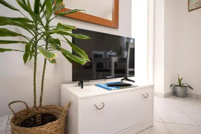 TV i/ili zabavni centar u objektu Apartments Bogdanić