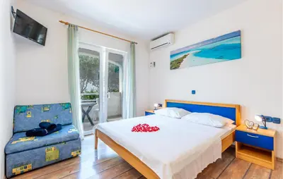 Krevet ili kreveti u jedinici u objektu 5 Bedroom Awesome Home In Stanici