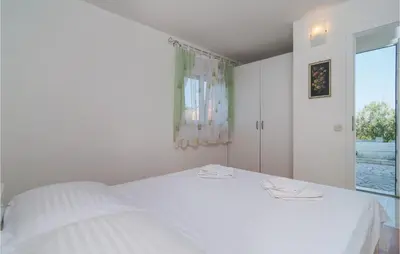Krevet ili kreveti u jedinici u objektu Holiday Home Stomorska With Sea View 12
