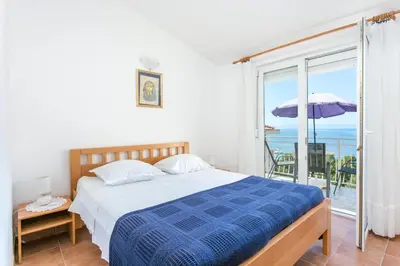 Krevet ili kreveti u jedinici u objektu Apartments by the sea Baska Voda, Makarska - 300
