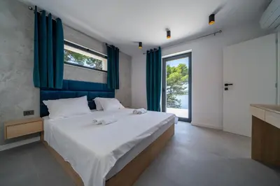 Krevet ili kreveti u jedinici u objektu Seaside luxury villa with a swimming pool Sumartin, Brac - 5639