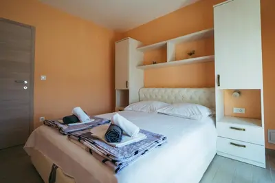Krevet ili kreveti u jedinici u objektu Family-friendly apartments with swimming pool Promajna, Makarska - 6849