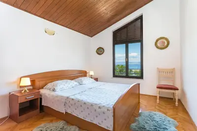 Krevet ili kreveti u jedinici u objektu Apartments by the sea Mirca, Brac - 732