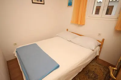Krevet ili kreveti u jedinici u objektu Apartments with parking space Baska Voda, Makarska - 6854